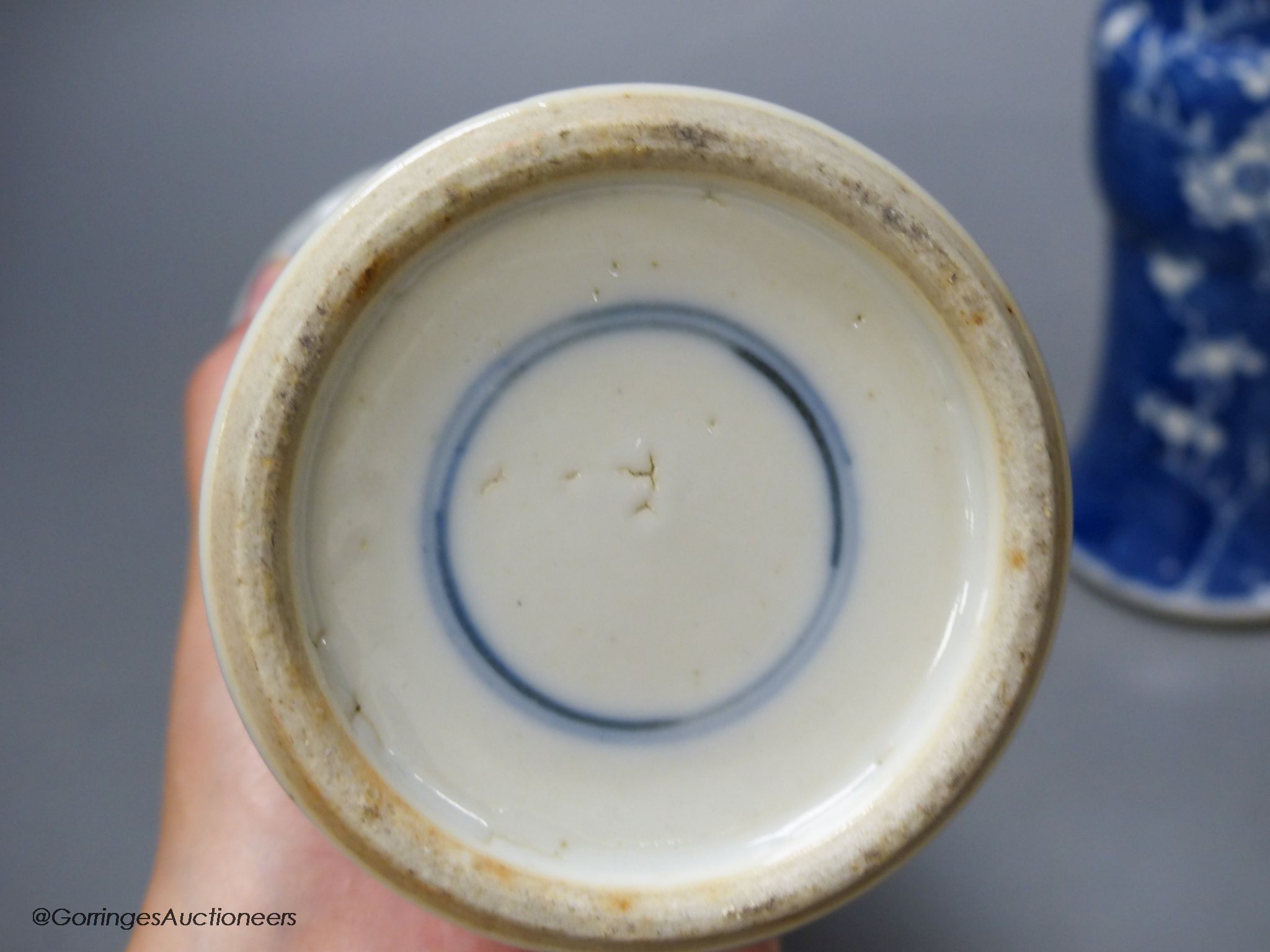 A pair of late 19th century Chinese blue and white prunus vases